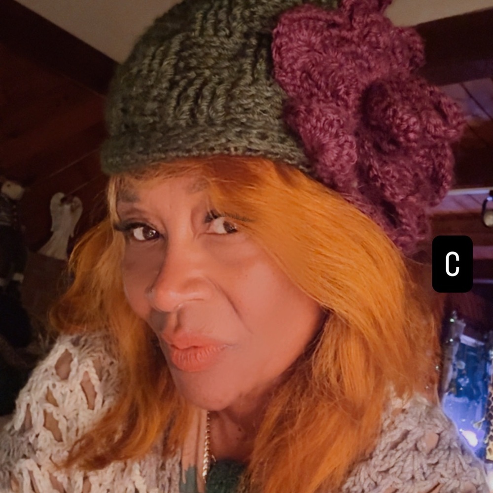 Chic Knit Hat with Purple Floral Detail
